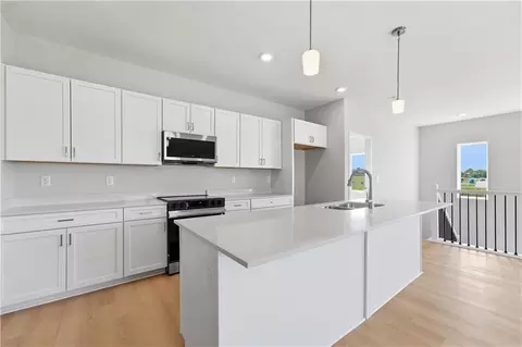 Kitchen - 1217 SE Windbreak St, Lees Summit, MO 64081 photo 2 of 2