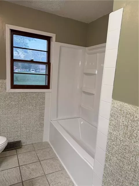 Bath - 1605 S Pine St, Holden, MO 64040 photo 1 of 3