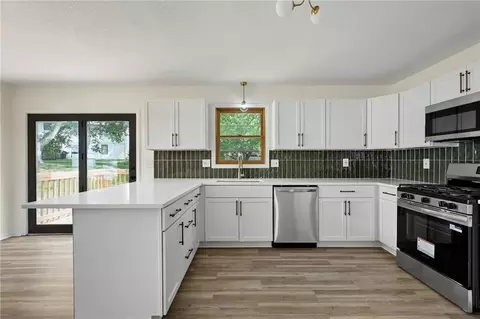 Kitchen - 1636 NE Thames Dr, Lees Summit, MO 64086 photo 2 of 4
