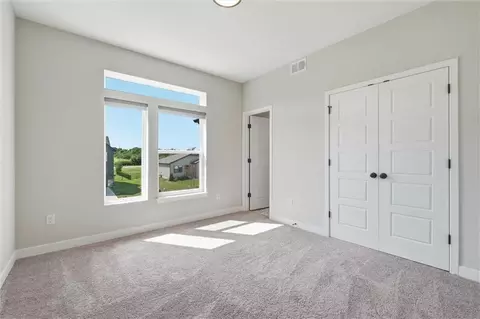 Bedroom - 413 Woodview Dr, Raymore, MO 64083 photo 7 of 9