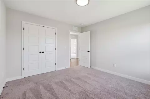 Bedroom - 413 Woodview Dr, Raymore, MO 64083 photo 4 of 9