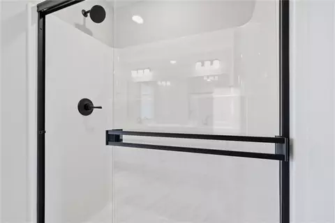 Bath - 413 Woodview Dr, Raymore, MO 64083 photo 3 of 5