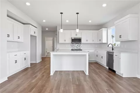 Kitchen - 413 Woodview Dr, Raymore, MO 64083 photo 2 of 4
