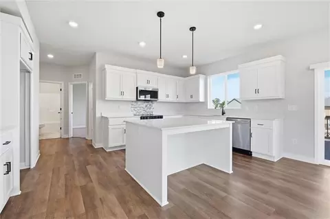 Kitchen - 413 Woodview Dr, Raymore, MO 64083 photo 3 of 4