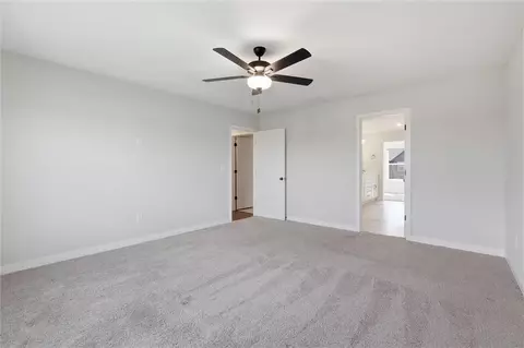 Bedroom - 413 Woodview Dr, Raymore, MO 64083 photo 2 of 9