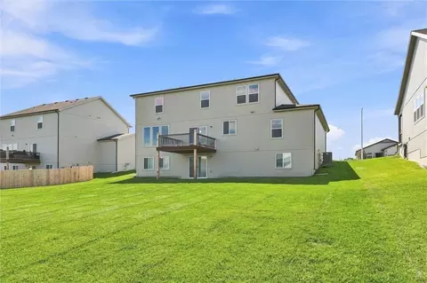 Exterior - 413 Woodview Dr, Raymore, MO 64083 photo 6 of 7