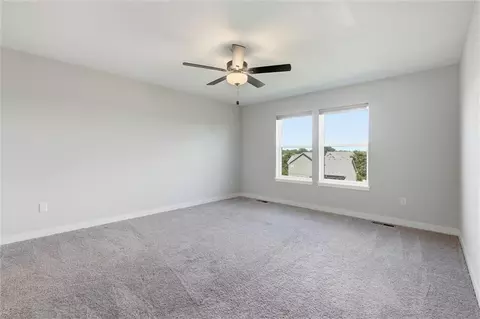 Bedroom - 413 Woodview Dr, Raymore, MO 64083 photo 1 of 9