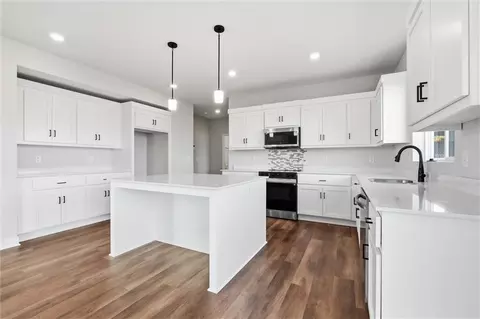 Kitchen - 413 Woodview Dr, Raymore, MO 64083 photo 1 of 4