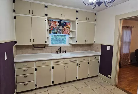 Kitchen - 913 E 5th St, Pittsburg, KS 66762 photo 1 of 3