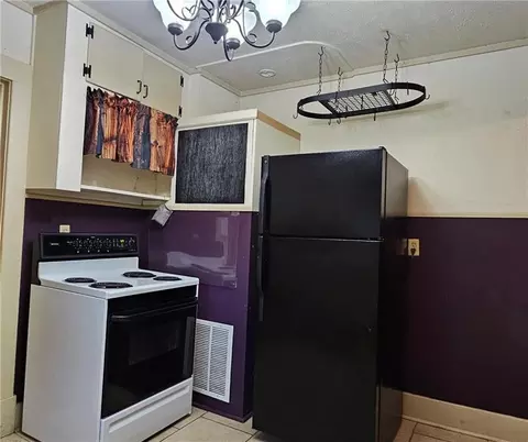 Kitchen - 913 E 5th St, Pittsburg, KS 66762 photo 2 of 3