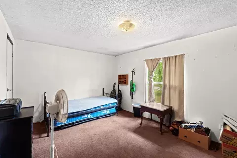 Bedroom - 845 S Carriage Dr, Deepwater, MO 64740 photo 4 of 5