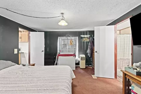 Bedroom - 845 S Carriage Dr, Deepwater, MO 64740 photo 3 of 5