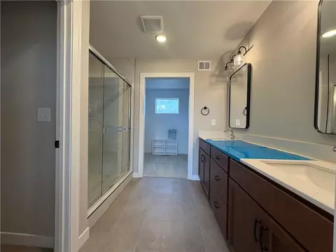 Bath - 830 Reed Dr, Raymore, MO 64083 photo 2 of 4