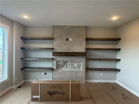 Living - 830 Reed Dr, Raymore, MO 64083 photo 3 of 5