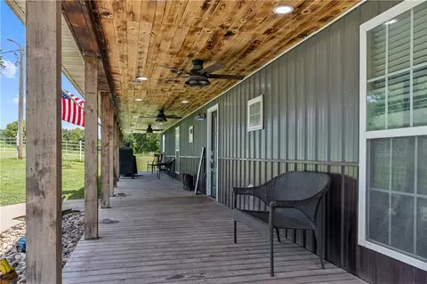 Exterior - 395 NW 1101st Rd, Centerview, MO 64019 photo 5 of 16