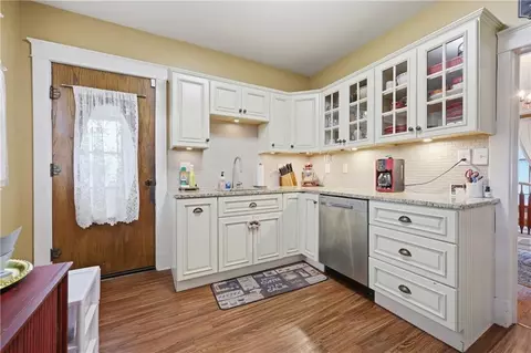 Kitchen - 200 E Main St, Odessa, MO 64076 photo 1 of 2