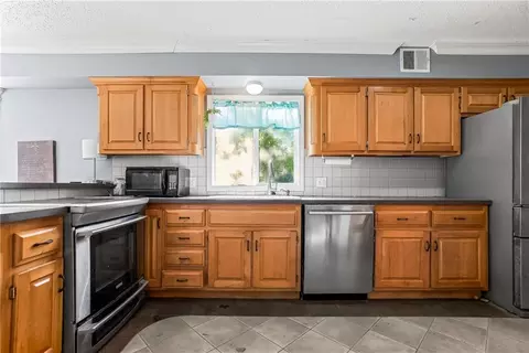 Kitchen - 11606 E 355th St, Drexel, MO 64742 photo 3 of 4