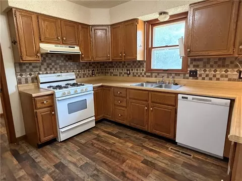 Kitchen - 916 E 8th St, Cherryvale, KS 67335 photo 1 of 3