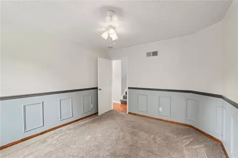 Bedroom - 226 N Sunset Ln, Raymore, MO 64083 photo 2 of 4