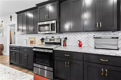 Kitchen - 1301 W 4th St, Cameron, MO 64429 photo 4 of 4