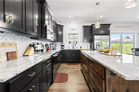 Kitchen - 1301 W 4th St, Cameron, MO 64429 photo 1 of 4