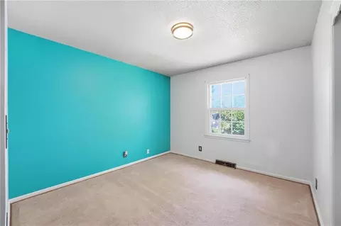 Bedroom - 1002 E Willow Dr, Olathe, KS 66061 photo 6 of 9