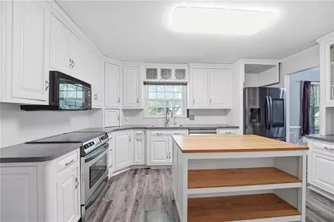 Kitchen - 1002 E Willow Dr, Olathe, KS 66061 photo 2 of 4