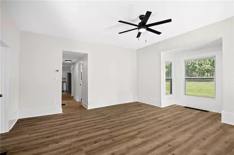 Living - 300 Maple St, Lathrop, MO 64465 photo 2 of 3