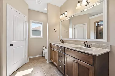 Bath - 308 E Olive St, Raymore, MO 64083 photo 1 of 3