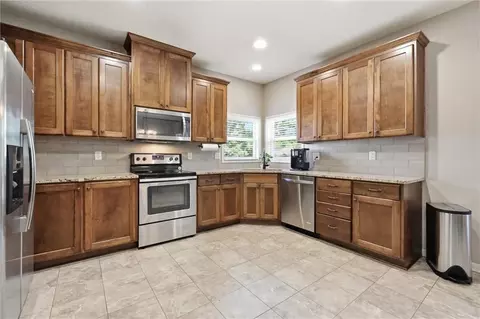 Kitchen - 308 E Olive St, Raymore, MO 64083 photo 1 of 4