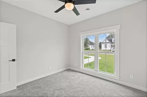 Bedroom - 102 E 4th St, Norborne, MO 64668 photo 6 of 7