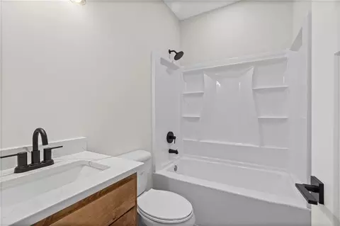 Bath - 102 E 4th St, Norborne, MO 64668 photo 3 of 3