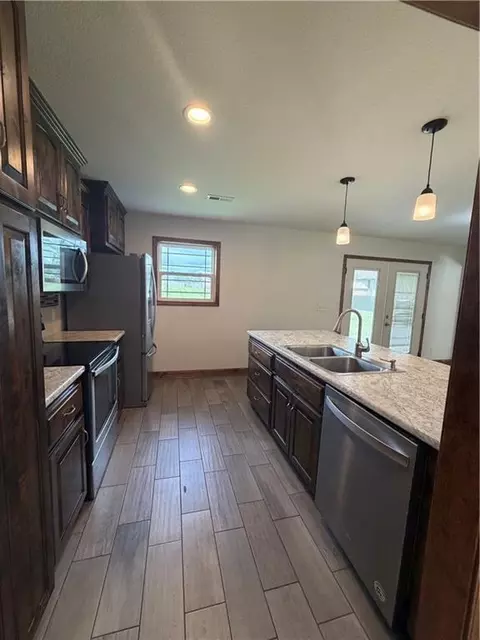 Kitchen - 203 Valley St, Lathrop, MO 64465 photo 4 of 5