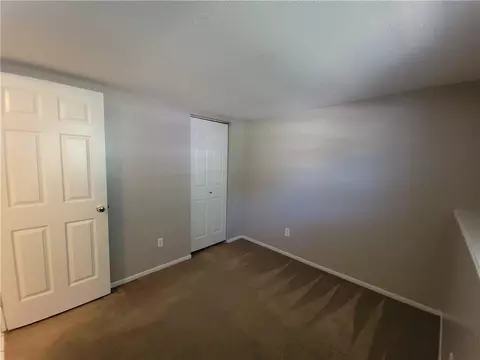 Bedroom - 205 NE Westwind Dr, Lees Summit, MO 64086 photo 2 of 6