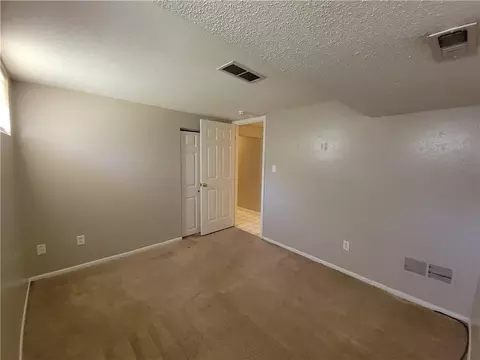 Bedroom - 205 NE Westwind Dr, Lees Summit, MO 64086 photo 5 of 6