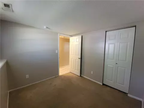 Bedroom - 205 NE Westwind Dr, Lees Summit, MO 64086 photo 3 of 6