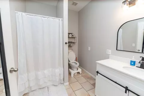 Bath - 104 Harlequin Dr, Adrian, MO 64720 photo 1 of 4
