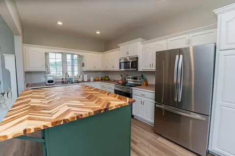 Kitchen - 104 Harlequin Dr, Adrian, MO 64720 photo 2 of 5