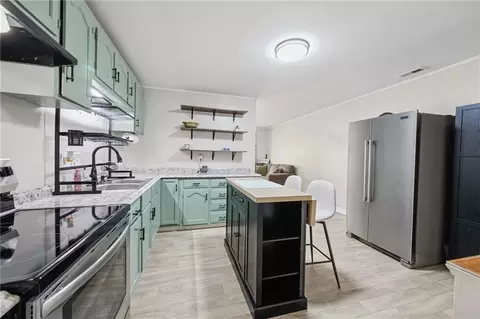 Kitchen - 302 E 3rd Dr, Independence, MO 64050 photo 3 of 4