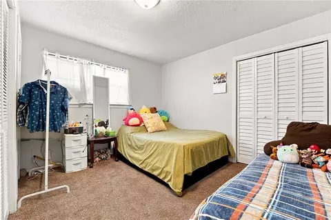Bedroom - 104 E Sunrise Dr, Belton, MO 64012 photo 2 of 8