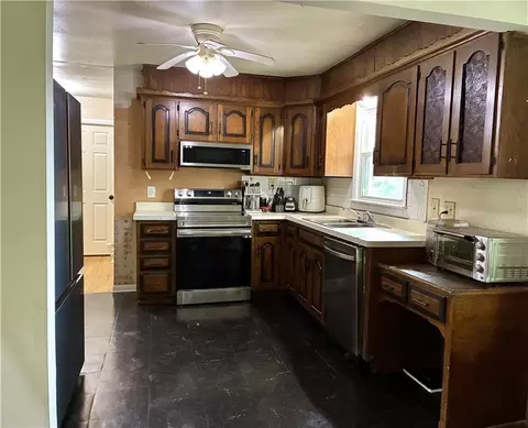 Kitchen - 205 E Maple St, Raymore, MO 64083 photo 2 of 2