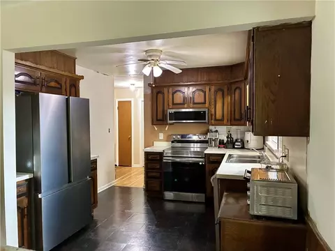 Kitchen - 205 E Maple St, Raymore, MO 64083 photo 1 of 2