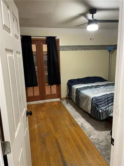 Bedroom - 205 E Maple St, Raymore, MO 64083 photo 1 of 4