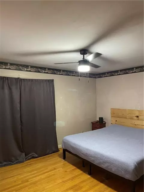 Bedroom - 205 E Maple St, Raymore, MO 64083 photo 2 of 4