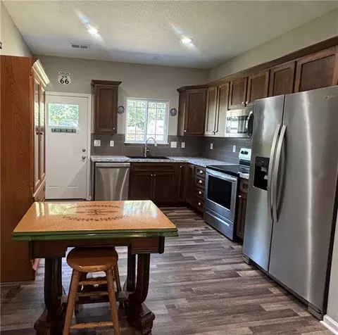 Kitchen - 413 E 2nd St, Ottawa, KS 66067 photo 2 of 2