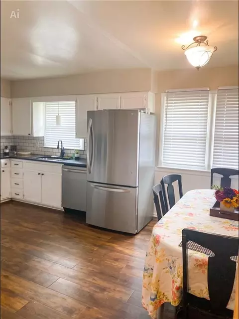 Kitchen - 702 NE Darwin St, Lees Summit, MO 64063 photo 2 of 4