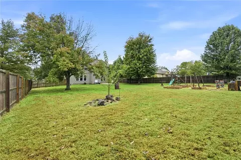 Exterior - 1404 Cedar Ridge Cir, Raymore, MO 64083 photo 5 of 6