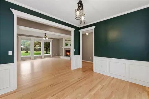 Living - 1404 Cedar Ridge Cir, Raymore, MO 64083 photo 6 of 9