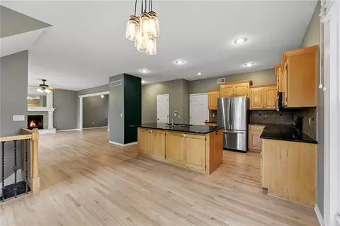 Living - 1404 Cedar Ridge Cir, Raymore, MO 64083 photo 8 of 9
