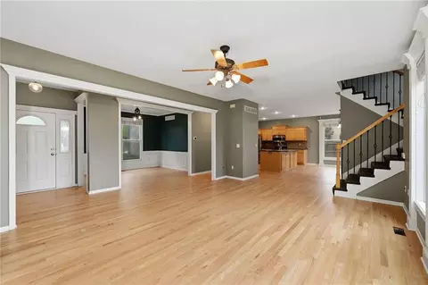 Living - 1404 Cedar Ridge Cir, Raymore, MO 64083 photo 2 of 9
